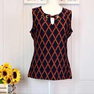 Tommy Hilfiger. Sleeveless blouse.